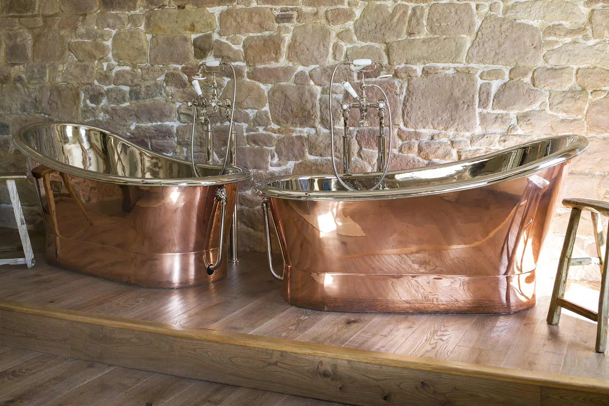 Two copper bathtubs