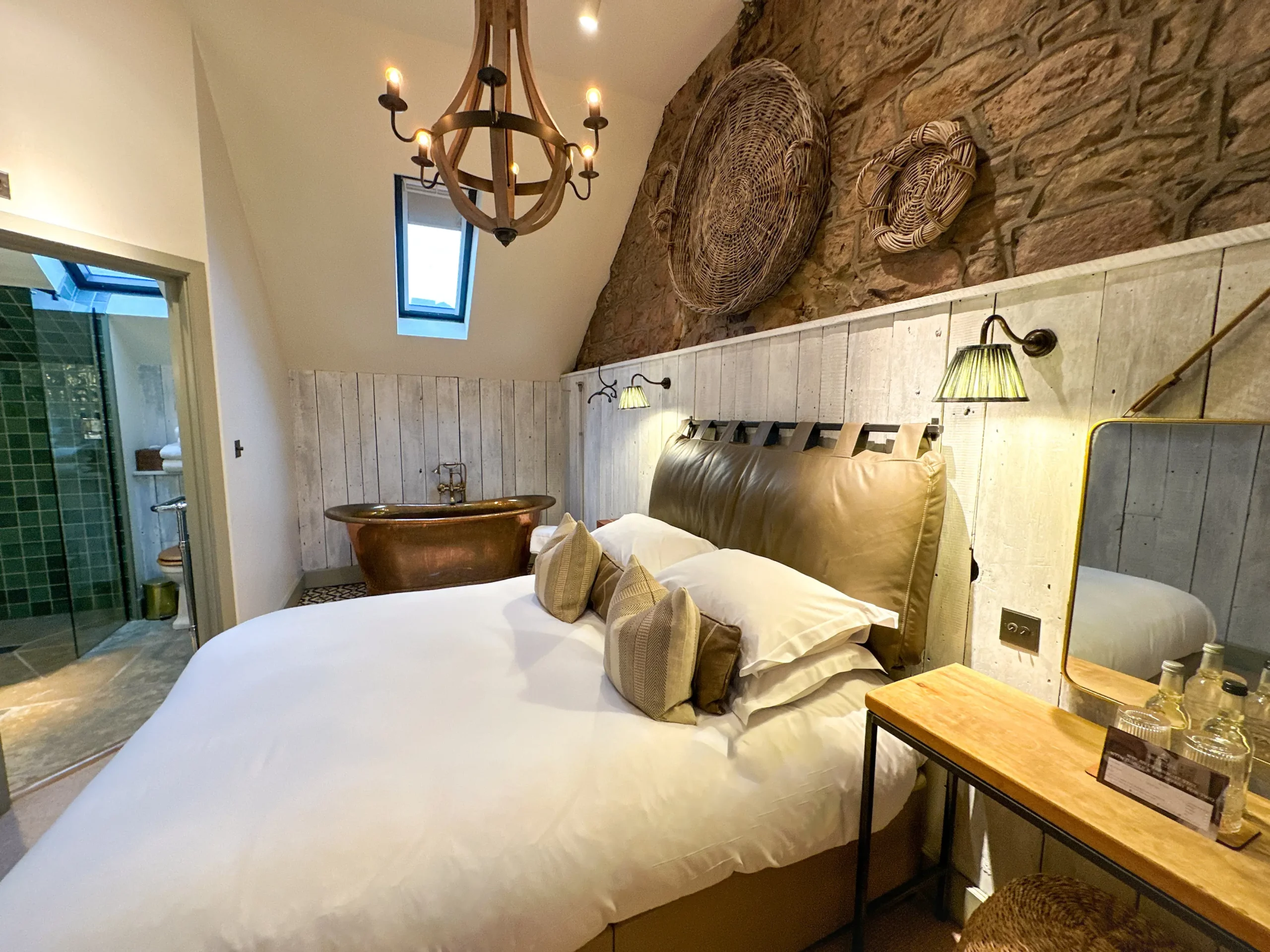 Bed with a bedside mirror and bath tub